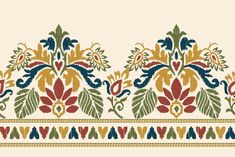 an embroidered border with colorful flowers and leaves