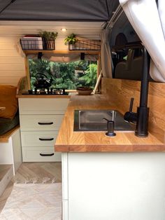 the kitchen is clean and ready to be used as a living area in an rv