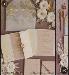 the wedding stationery is laid out and ready to be put into the bride's bouquet