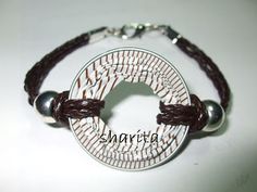 a bracelet with the word shareta written on it