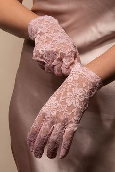 Made from high-quality lace material, these gloves are both delicate and durable. The intricate design and floral pattern add a timeless beauty that will complement any formal or semi-formal attire. With a comfortable and secure fit, these gloves are perfect for any occasion, from weddings to fancy dinners or even costume parties. SizeLength: 10 in (25.4 cm)Width: 3 in (7.62 cm) QualityMade of cotton, polyester, linen, and silk. Fabric is breathable so gloves can be worn for extended periods of Pink Lace Gloves, Gown With Gloves, Marry Rich, Net Gloves, Fancy Gloves, Fancy Dinners, Silk Gloves, Satin Gloves, Semi Formal Attire