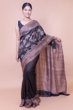 It is a classic dark brown silk saree. This is perfect as evening wear or as party wear. The best part about this saree is that it's a nature-centric saree. The leaf pattern makes it more beautiful. Another interesting part of this pure silk saree is that the border has a texture created through the block shifting technique. These printed silk sarees play an important role in Indian culture. Like pure silk saree, silk holds an important position in Indian culture. The impact of pure silk saree on Indian art and culture is huge. It is the most loved fabric and is considered grand. A woman's wardrobe is incomplete without a silk saree.  A special saree for a special occasion Printed silk sarees hold a special position on every special occasion in India. You can wear a pure silk saree at wedd Black Silk Handloom Pre-draped Saree, Black Saree With Printed Motifs, Black Saree With Printed Motifs For Diwali, Black Handloom Silk Pre-draped Saree, Black Silk Pre-draped Saree With Self Design, Unstitched Black Saree With Kalamkari Print, Elegant Kalamkari Print Saree For Diwali, Elegant Silk Saree With Kalamkari Print, Brown Silk Saree With Zari Work