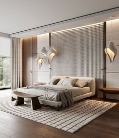 a large bed sitting on top of a wooden floor next to a wall mounted light