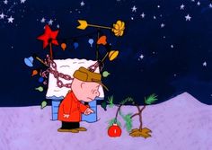 a cartoon character is chained to a tree in the snow with other characters around him