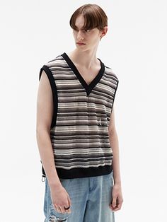 Editor's Notes This vest features semi-oversized silhouette, V-neck, striped pattern. It can be styled in various ways.- Semi-oversized silhouette- V-neck- Striped patternMeasurements(in.)M / L- Shoulder: 22.83 in. / 23.62 in. - Chest: 24.02 in. / 25.20 in. - Total length: 25.59 in. / 26.18 in. Composition & Care- 98% Polyester, 2% Spandex- Please check the care labelDesigner- by DNSR Casual Striped V-neck Sweater Vest, Striped V-neck Tank Top For Spring, Striped V-neck Vest Top, Striped Sleeveless Sweater Vest For Fall, Striped Sleeveless Tops For Fall, Striped Sleeveless Top For Layering, Sleeveless Striped Tops For Layering, Sleeveless Striped Tops For Fall, Striped Vest