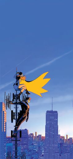 an image of a city skyline with a batman flying over the top of a building