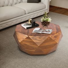 This unique diamond-shaped coffee table is made from acacia wood and features a smooth top that can be used for serving and various decorative purposes. It features a trimmed geometric pattern over its body along with a flat base, providing it with good stability. The Dark brown finish adds depth to its wooden texture, showcasing a great piece of artistry. Transform your setting into a casual space by adding this coffee table with your favorite set of chairs. Check out our Bon collection for mor Wooden Cocktail Table, Round Wood Coffee Table, Reclaimed Wood Coffee Table, Relaxing Chair, Wooden Texture, Oval Coffee Tables, Unique Tables, Plywood Furniture, Handcrafted Art