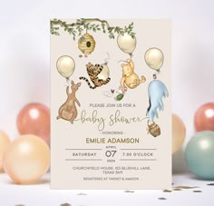 a baby shower with balloons and animals on it