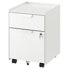 a white filing cabinet with two drawers and wheels on the bottom, one drawer is open