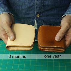 a person holding two different types of wallets