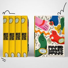 the four books are yellow and have different designs on them