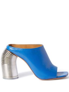 Step into the new season with these stunning leather mules from Off-White. In a striking cobalt blue with a shimmering silver tone, these open-toe slip-ons are the epitome of luxury and style. The standout feature? A uniquely designed cylindrical heel that resembles the iconic Slinky toy - a bold and playful twist that will make you the center of attention wherever you go. Crafted from high-quality leather Eye-catching cobalt blue with silver tone Open-toe slip-on style Branded heel counter Uniq Blue Leather Flats, White Runway, Spring Heels, Dream Fashion, High Heel Mules, On Logo, Heel Mules, Leather Sandals Flat, Womens Mules