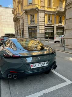 a black sports car parked on the street