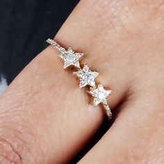 ❂ This ring made with natural diamonds in 14k yellow gold, ❂ Pave Diamond Three Star Ring Solid Gold Jewelry. ❂ Diamond Ring, Star Ring, Gold Ring, Everyday Jewelry ❂ Special customize for Mother's day, Anniversary, Birthday Gift, Valentine, Christmas. ❂ Item Details: Gross Weight: 2.05 Grams 14k Yellow Gold Weight: 2.00 Grams Diamond Weight: 0.25 Carats Item Size: US 7 Item SKU: ZR-2701 Gemstone color may vary due to natural and availability. This is a made to order design. Please allow 7-10 da Star-shaped Cubic Zirconia Wedding Jewelry, Cubic Zirconia Jewelry For Christmas Anniversary, Celestial Jewelry With Brilliant Cut For Anniversary, Celestial Style Jewelry With Brilliant Cut For Anniversary, Celestial Jewelry For Anniversary With Brilliant Cut, Anniversary Celestial Jewelry With Brilliant Cut, Christmas Anniversary Jewelry With Cubic Zirconia, Sparkling 14k Gold Wedding Jewelry, Christmas Anniversary Cubic Zirconia Jewelry