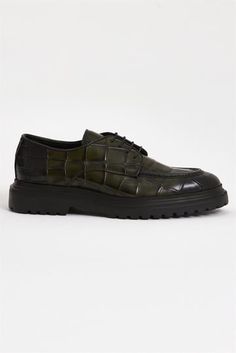 Elevate your footwear game with our Green Croco Patterned Brogue Shoes, meticulously crafted from genuine crocodile leather. These stylish shoes feature a rich green hue, perfectly complemented by a distinctive crocodile pattern. They add a touch of sophistication to any casual outfit. The thick EVA sole provides exceptional comfort and durability, ensuring you stay stylish and comfortable throughout the day. Inside, the soft calfskin lining offers a luxurious feel, making these shoes as comfort Leather Dress Shoes With Crocodile Pattern For Work, Crocodile Pattern Leather Dress Shoes For Work, Leather Wingtip Oxfords With Crocodile Pattern, Luxury Green Loafers, Green Plain Toe Leather Shoes For Work, Green Oxfords With Leather Sole For Work, Green Leather Sole Oxfords For Work, Wingtip Leather Shoes With Crocodile Pattern, Green Leather Shoes With Leather Sole For Work