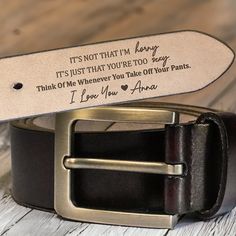 a leather belt with the words, it's not that i'm sorry