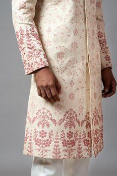 Champagne sherwani with jaal embroidered motifs, sequin and aari, dabka work. Paired with churidar.
Component: 2
Embroidered
Neckline: Mandarin
Sleeve Length: Full
Fabric: Linen Satin, Malai Cotton
Color: Peach
Closure: Concealed buttons
Note: Inner kurta worn by the model is not for sale - Aza Fashions Festive Sherwani With Resham Embroidery, Diwali Sherwani With Resham Embroidery, Diwali Resham Embroidery Straight Sherwani, Designer Sherwani With Chikankari Embroidery In Straight Kurta Style, Festive Chikankari Embroidery Sherwani Straight Kurta, Festive Sherwani With Chikankari Embroidery, Pink Sherwani With Intricate Embroidery, Pink Embroidered Sherwani Straight Kurta, Designer Pink Sherwani With Cutdana