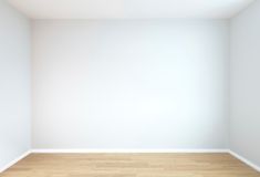 an empty room with white walls and wood floors