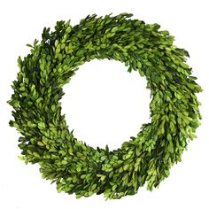 a wreath with green leaves is shown on a white background