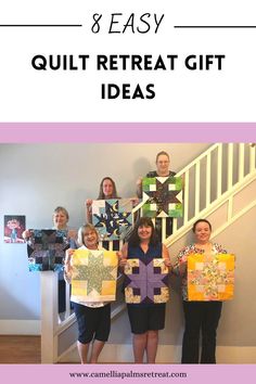 the girls are holding up their quilts to show off their gifts