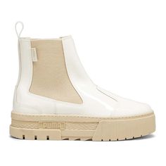 This season, we've given a classic Chelsea boot a PUMA twist for the trendsetters, streetstyle enthusiasts and the hype girls. The stand-out silhouette takes inspiration straight from the streets, with a statement-making stacked sole from the Mayze for an edgy look, but we've added in some contrasting rubber tooling and a rubber-like upper with elastic panels for a shiny effect. $34.95 Padded Ankle Boots For Streetwear In Fall, Fall Streetwear Boots With Padded Ankle, Ankle-high Chelsea Boots For Streetwear In Fall, Ankle-high Chelsea Boots For Fall Streetwear, Spring Casual High Ankle Moto Boots, Urban High Ankle Boots For Fall, Spring Platform Moto Boots For Streetwear, Spring High Ankle Moto Boots For Streetwear, High Ankle Moto Boots For Spring Streetwear