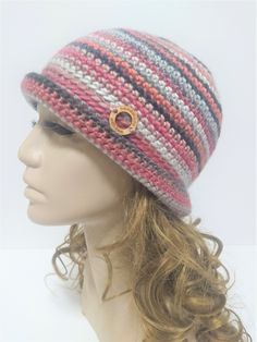 Stylish, retro woman hat, a colorful, fancy hat made of wool, style bucket hat. Very warm and cozy, becasue it's made of wool and acrylic. The majority of wool (60%) in the yarn gives You warmth and softness, the acrylic (40%) prevents from itchiness and makes the item durable. The hat is very comfortable in many ways - soft, fancy, warm, and You can put it in Your bag when it's necessary and it won't rumple or loose it's shape.  The hat in the foto fits a standard woman's head circumference 54-56 cm, it's rather an M-size, it's about 22cm high with the brim. Please let me know if You wish Your hat in other size. I will be happy to crochet it for You :-) Hand wash using a detergent for woolen clothes, do not use any bleach, or fabric softeners. Remember to dry your hat flat and don't let i Multicolor Yarn Crochet Hat, Multicolor Crochet Yarn Hat, Retro Yarn Beanie Hat, Retro Crochet Beanie Hat For Winter, Retro Handmade Crochet Hat For Winter, Handmade Retro Crochet Hat For Winter, Multicolor Handmade Cloche Hat With Curved Brim, Hand Knitted Cloche Hat One Size, Handmade Multicolor Cloche Hat With Curved Brim