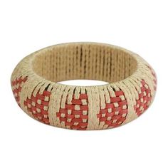 Geometric motifs evoke arrows on a handcrafted bracelet. Designed by Kalyani Gupta this beautiful bangle showcases the textures of woven rattan. Adjustable Woven Bangle Bracelet, Artisan Adjustable Bangle Bracelets, Bohemian Fair Trade Bracelets, Traditional Handmade Brown Bangle, Fair Trade Bracelets For Gift, Handwoven Bangle Cuff Bracelet As Gift, Handwoven Cuff Bangle Bracelet As Gift, Bohemian Woven Cuff Bangle Bracelet, Handmade Artisan Bangle