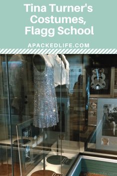 a display case filled with items and text that reads, trina turner's costumes, flag school