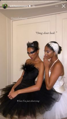 two women dressed in black and white posing for the camera with their hands on their face