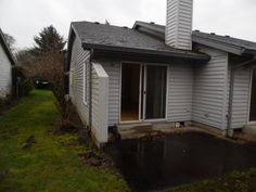 the back of a house that has been gutted