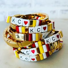 One size fits most KC heart stretch bracelet.  Just slide on your wrist. Great for Kansas City Football game days or to just show your KC pride! Chiefs Friendship Bracelet, Kansas City Chiefs Friendship Bracelet, Kansas City Chiefs Bracelets, Chiefs Bracelet, Kansas City Bracelets, Kc Chiefs Earrings, Kansas City Chiefs Jewelry, Tile Bracelet, Kc Football