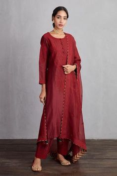 Garnet red long kurta with all-over dori work embroidery. Comes with handwoven chanderi salwar and silk organza dupatta.
Component: 3
Embroidered
Neckline: Round
Sleeve Length: Long
Fabric: Kurta and Pant: Handwoven Chanderi; Kurta: Cotton Voile; Dupatta: Silk Organza
Color: Red

Button placket - Aza Fashions Karva Chauth, Red Kurta, Kurta Cotton, Garnet Red, Indian Textiles, Sharara Set, Organza Dupatta, Embroidered Neckline, Silk Organza