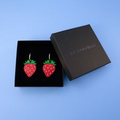 Meet our Strawberry hoop earrings that are as juicy as they are charming. An effortless accessory for daily wear or special occasions, these dimensional pieces will elevate your look with elegance and delight!  Designed and produced in-house, using marbled pearlescent and mirrored acrylic with hand-stained wood, these pieces are made to last.  The strawberry charms hang from 18mm, 14k gold-filled hoops and are removable so the hoops can be worn on their own—two earrings in one, perfect for trave Trendy Lever Back Earrings As Gift, Strawberry Charm, Green Strawberry, Mirrored Acrylic, Hoop Charms, Gold Filled Hoops, Stained Wood, Extreme Heat, Elevate Your Look