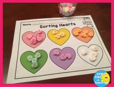 valentine's day sorting hearts with candy and marshmallows