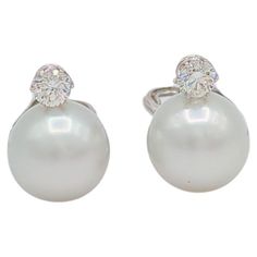 Beautiful 13.5 mm white South Sea round pearls with 1.02 ct. good quality white diamond rounds. Handmade in 18k white gold. Pearl Diamond Earrings, Pearl And Diamond Earrings, Sea Pearl, South Sea Pearls, Sea Pearls, Pearl Diamond, White Diamond, Pearl White, Good Quality