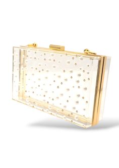 Be the life of the party with the NINA clutch! This stylish lucite box clutch purse offers unique flair with a silver metal frame that is embellished with Austrian crystals and pearls that are placed in a polka dot pattern that won't go unnoticed. Show off some sass and store all your necessities in this fun, one-of-a-kind clutch! The purse is embellished with scattered gold Austrian crystals and off-white Austrian pearls. Chic Clear Clutch For Party, Chic Clear Party Clutch, White Modern Clutch For Parties, Modern White Clutch For Parties, Elegant Clear Rectangular Clutch, Elegant Rectangular Clear Clutch, Box Clutch, Life Of The Party, Polka Dot Pattern