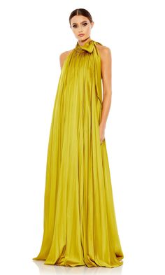 Long trapeze pleated formal dress with high neck and open back. Halter Neck Gown, Designer Formal Dresses, Unique Prom Dresses, Sleeveless Gown, Satin Gown, Mac Duggal, Loose Dress, Spring Green, Halter Neckline