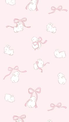 a pink wallpaper with rabbits and bows on it