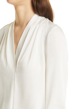 A stretch-kissed silk blouse adds a lustrous layer and an elegant drape to whatever your day (or night) has in store. Style Name:Kobi Halperin Nellie Stretch Silk Blouse. Style Number: 6241719. Fitted Silk Pre-draped Blouse, Elegant White Viscose Top, White Viscose Formal Tops, Formal White Viscose Tops, Elegant Cream Silk Blouse, Elegant White Evening Blouse, Cream Silk Evening Blouse, Silk Cream Evening Blouse, Cream Silk Blouse For Evening