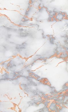 an abstract marble pattern with gold and white colors