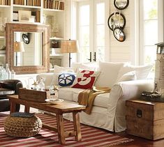 a living room filled with furniture and decor