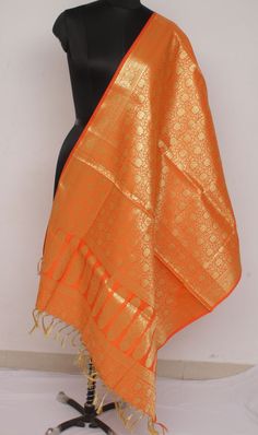 Orange Banarasi Dupatta Indian Art Silk Woven Zari Brocade Long Stole Scarves Orange Banarasi Dupatta Indian Art Silk Woven Zari Brocade Long Stole Scarves Product Description: A Gorgeous Piece of Banarasi Brocade Zari Woven Dupatta .. Fabric of this Dupatta is Art Silk or Artificial Silk, This Dupatta can be worn on Sarees & Suits on Parties and special occasion. One can also use this Dupatta as a Multi-Purpose fabric to make some thing New Cushion & Table Runners, Beautiful Dress and many more Festive Handloom Dupatta As Gift, Festive Handloom Dupatta For Gifts, Festive Handloom Dupatta Gift, Gold Dupatta With Zari Work As Gift, Traditional Handloom Dupatta As Gift, Gold Dupatta For Festivals And Gifts, Traditional Zari Weaving Dupatta, Traditional Banarasi Silk Dupatta As Gift, Traditional Banarasi Silk Dupatta For Gift