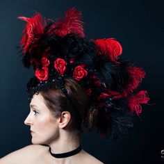 ROSA - this stunning mohawk headdress features lavish ostrich feather, coque and schlappen feather plumes in shades of red and black. The base is embellished with sequin material, velvet roses, diamante stones and embellished braids and motifs. Fastens securely to the head to allow for freedom of movement. Each SparkleKitten piece is carefully handmade to be durable using traditional and innovative millinery techniques. Festival Ostrich Feather Trim Headpiece, Festival Headpiece With Ostrich Feather Trim, Ostrich Feather Trim Headpieces For Festivals, Costume Party Hats With Ostrich Feathers, Ostrich Feather Trim Hat For Costume Party, Costume Party Hat With Ostrich Feather Trim, Embellished Braids, Mohawk Headpiece, Feather Mohawk