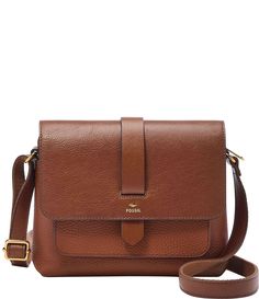 From Fossil&#x2C; the Kinley Small Fold Over Leather Crossbody Bag features: LeatherOld English brass hardwareZipper closureInterior slide pocket and zipper pocketExterior magnetic snap pocketAdjustable strapApprox. 9" L x 3.25" W x 7.25" H bag; 21.5" strap drop1-year limited warrantyImported. Leather Cross Bag, Bags Trendy, Crossbody Travel Purse, Fossil Bag, Crossbody Bags For Women, Best Travel Purses For Women, Formal Fall Flap Bags, Fall Travel Bags With Metal Hardware, Crossbody Handbags