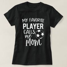 a black t - shirt that says my favorite player calls me mom