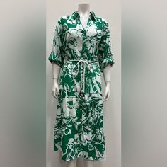 Mlle Gabrielle Plus Size Printed Cotton Collared 3/4 Roll Tab Sleeve Button Down Dress With Front Tie And Lining 3/4 Sleeve Shirt Dress For The Beach, Green 3/4 Length Dress For Spring, Green Shirt Dress With Button Closure For Beach, 3/4 Sleeve Beach Dress With Buttons, Green 3/4 Sleeve Midi Dress For Summer, Green 3/4 Sleeve Summer Midi Dress, Green Midi Shirt Dress For The Beach, Casual Green Dresses With 3/4 Sleeves, Green Summer Midi Dress With 3/4 Sleeves