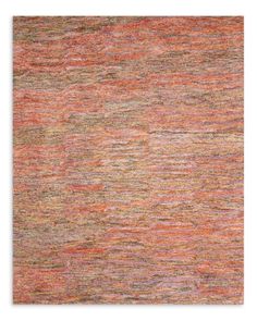 an orange and grey rug with different colors