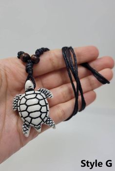 "Black turtle necklace Unisex Design Matte Black Turtle Pendant Dimensions: 1\" Inch x 1.5\" Inches This necklace can be used short or long : you can adjust the cord when ever you want. FAST SHIPPING! Visit my Etsy Shop to see more Designs! Handmade Turtle Earrings, Turtle Bracelets and Turtle Necklaces. https://www.etsy.com/shop/FreedomLifeStyle" Turtle Necklace Pendants, Black Spiritual Jewelry For The Beach, Spiritual Black Jewelry For Beach, Spiritual Black Jewelry For The Beach, Black Spiritual Necklace For Beach, Black Casual Necklace With Adjustable Cord, Casual Black Necklace With Adjustable Cord, Casual Black Pendant Jewelry, Black Beach Jewelry With Adjustable Cord