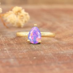 Lavender fire Ethiopian opal ring for women, October birthstone opal jewelry, Minimalist ring, ring for her, Genuine fire opal ring, Minimalist ring, Ring for her Gorgeous fire opal jewelry, Gemstone ring, Gift for her. *Other Similar Jewelry Available Here* https://www.etsy.com/shop/AreebaJewelry Details:- Gemstone - Ethiopian opal  Stone Color - Natural  Stone Setting - Prong Quality - AAA Grade Rize Size - 4 US TO 9 US Available Type - 100% Natural  Shipping service - Free worldwide shipping Opal Open Ring Birthstone, Ethiopian Opal Promise Ring, Teardrop Opal Ring As A Gift, Solitaire Opal Ring In Round Shape, Anniversary Solitaire Opal Ring, Round Solitaire Opal Ring, Solitaire Opal Ring With Round Shape, Anniversary Pink Opal Gemstone Ring, Anniversary Pink Opal Ring