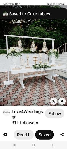 the wedding table is decorated with flowers and candles